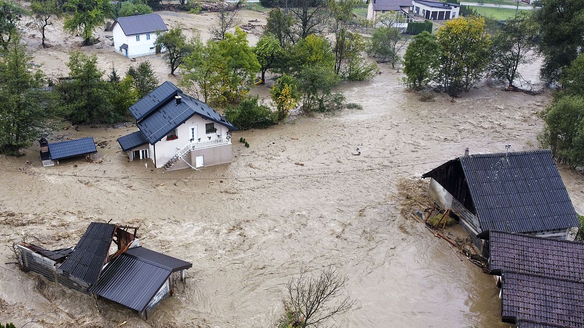 Flooded houses after a heavy rain in the village of Luke, near Bosnian town of Fojnica.