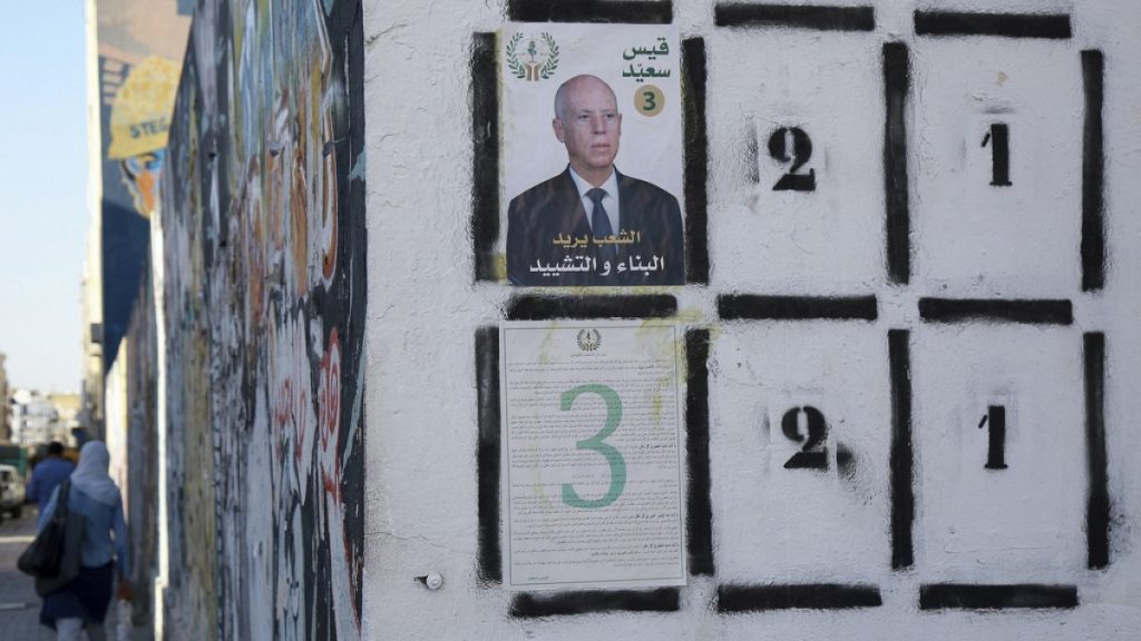 FILE - Election poster for Tunisian president Kais Saied pictured in Tunis ahead of the upcoming presidential elections, in Tunis, Tunisia,