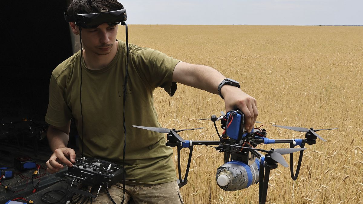 A Ukrainian serviceman operates a drone on the frontline in the Zaporizhzhia region, June 14, 2024