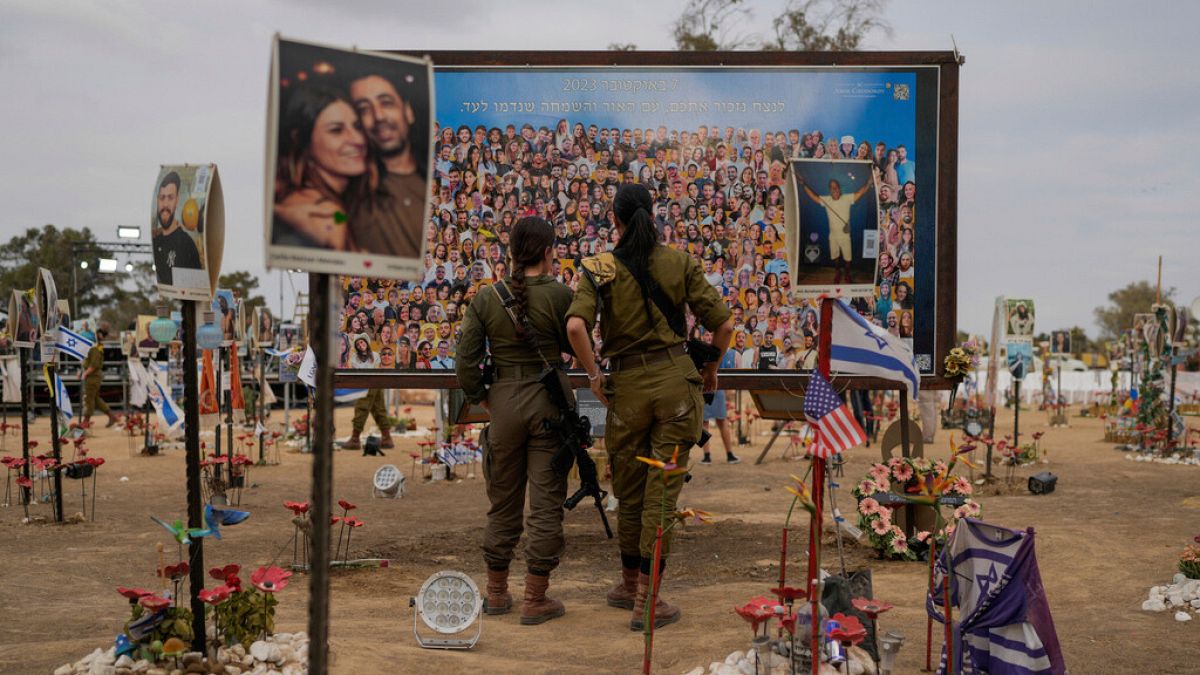 Soldiers visit the site of the Nova music festival, where hundreds of revellers were killed and abducted by Hamas in southern Israel on Sunday 6 October, 2024.