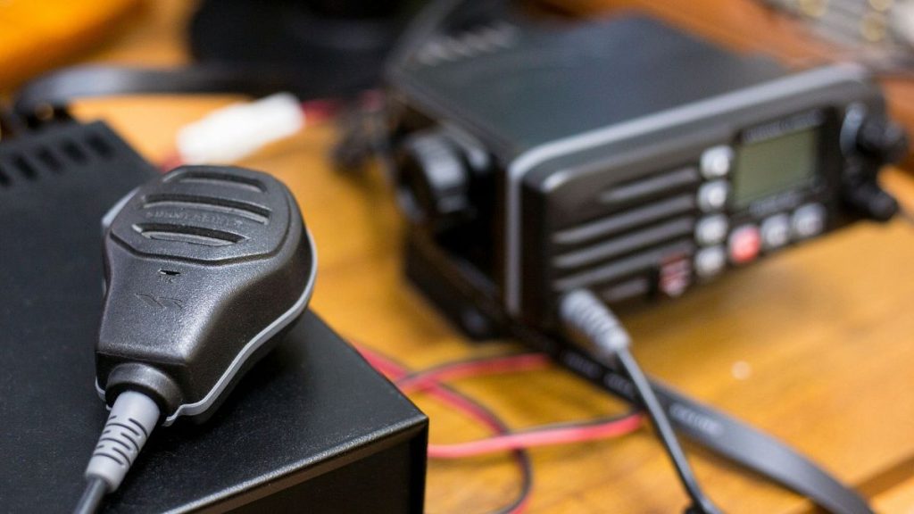 Close-up of an old radio with cable and plug