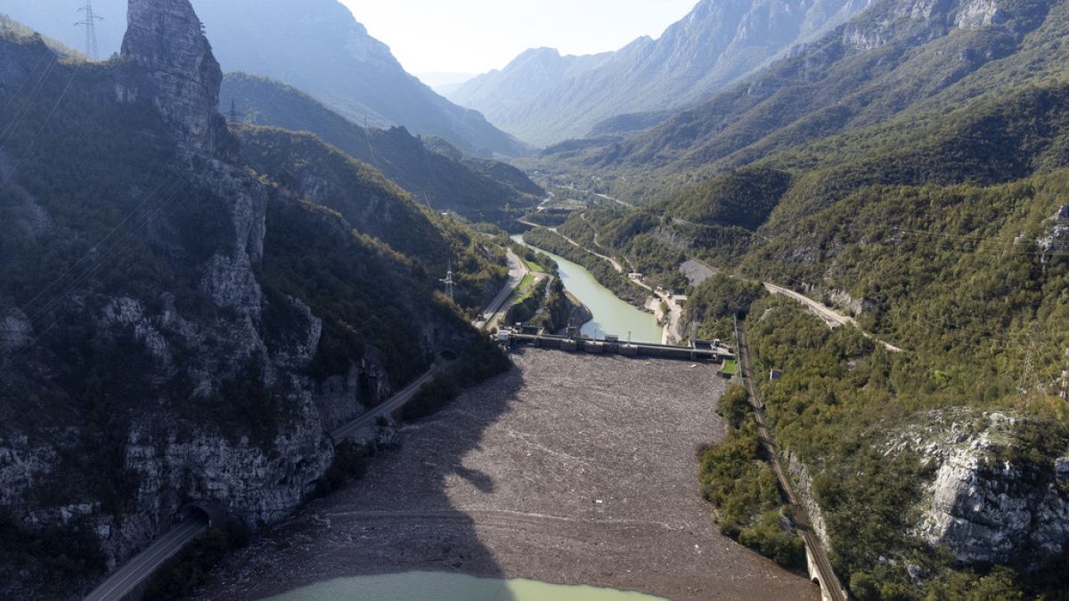 Aerial view of waste stuck at the dam on the Neretva river caused by landslides, torrential rain and flash floods in Grabovica, Bosnia, Sunday, Oct. 13, 2024.