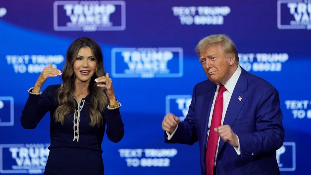 Donald Trump and South Dakota Gov. Kristi Noem dance to the song