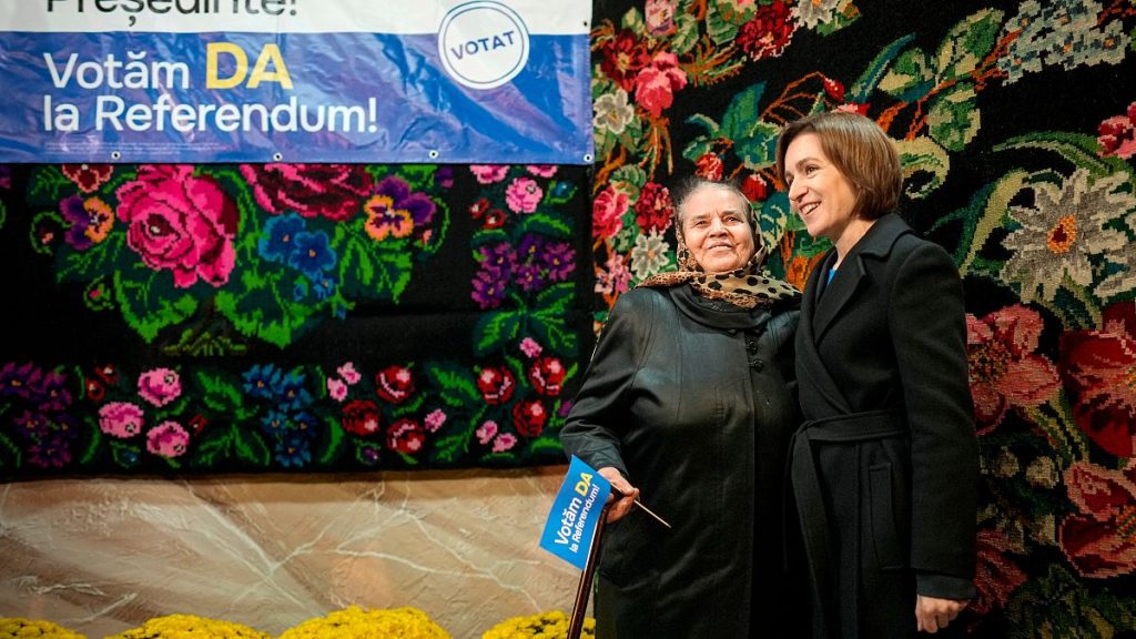 Maia Sandu with a voter during Moldova