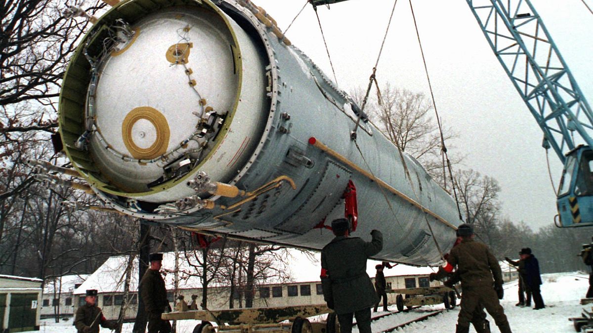 Soldiers prepare to destroy a ballistic SS-19 missile in the yard of the largest former Soviet military rocket base in Vakulenchuk, 220 kilometers west of Kyiv, Dec. 24, 1997