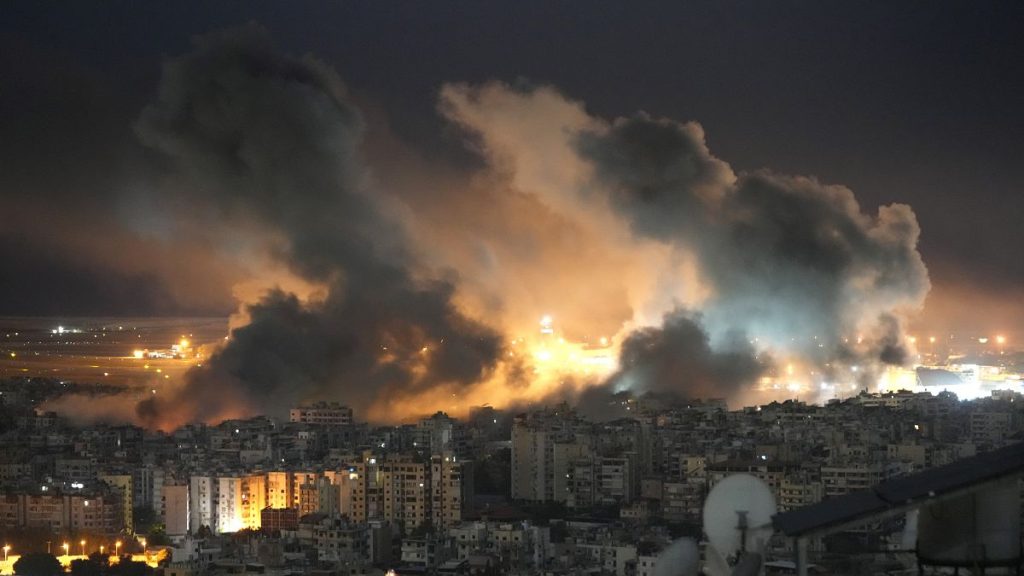 Flames and smoke rise from an Israeli airstrike in the southern suburbs of Beirut, 20 October, 2024