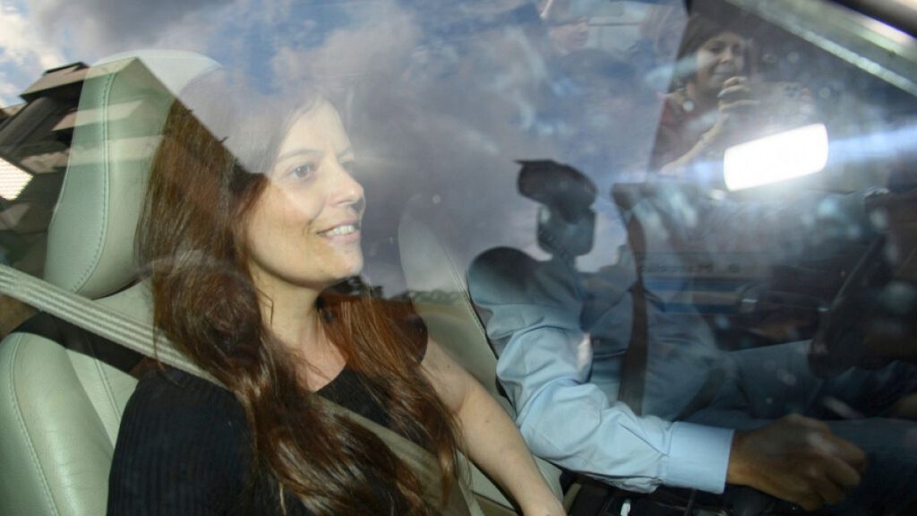 Italian activist Ilaria Salis arrives with her father Roberto at their home in Monza, Italy, Saturday, June 15, 2024.