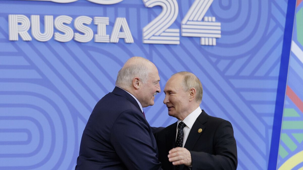 Lukashenko and Vladimir Putin at the BRICs conference on Wednesday