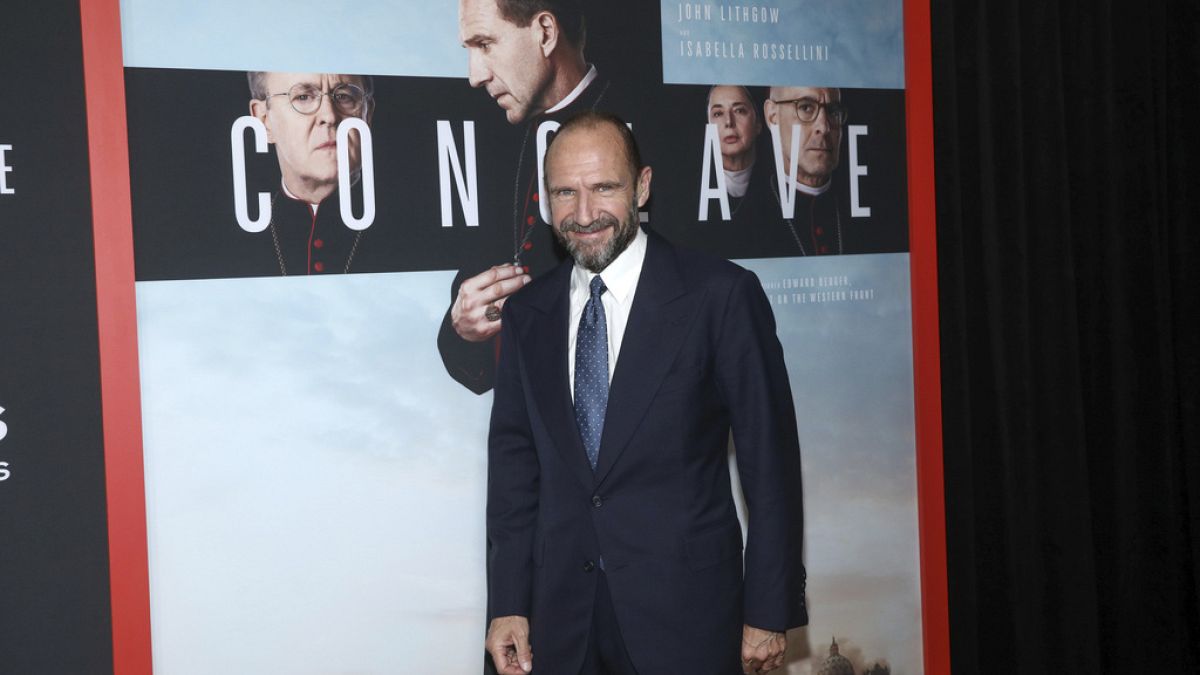 Actor, Ralph Fiennes poses on the red carpet before the screening of the movie