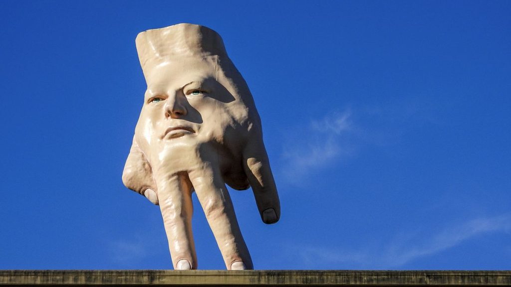 New Zealand waves goodbye to divisive giant hand sculpture