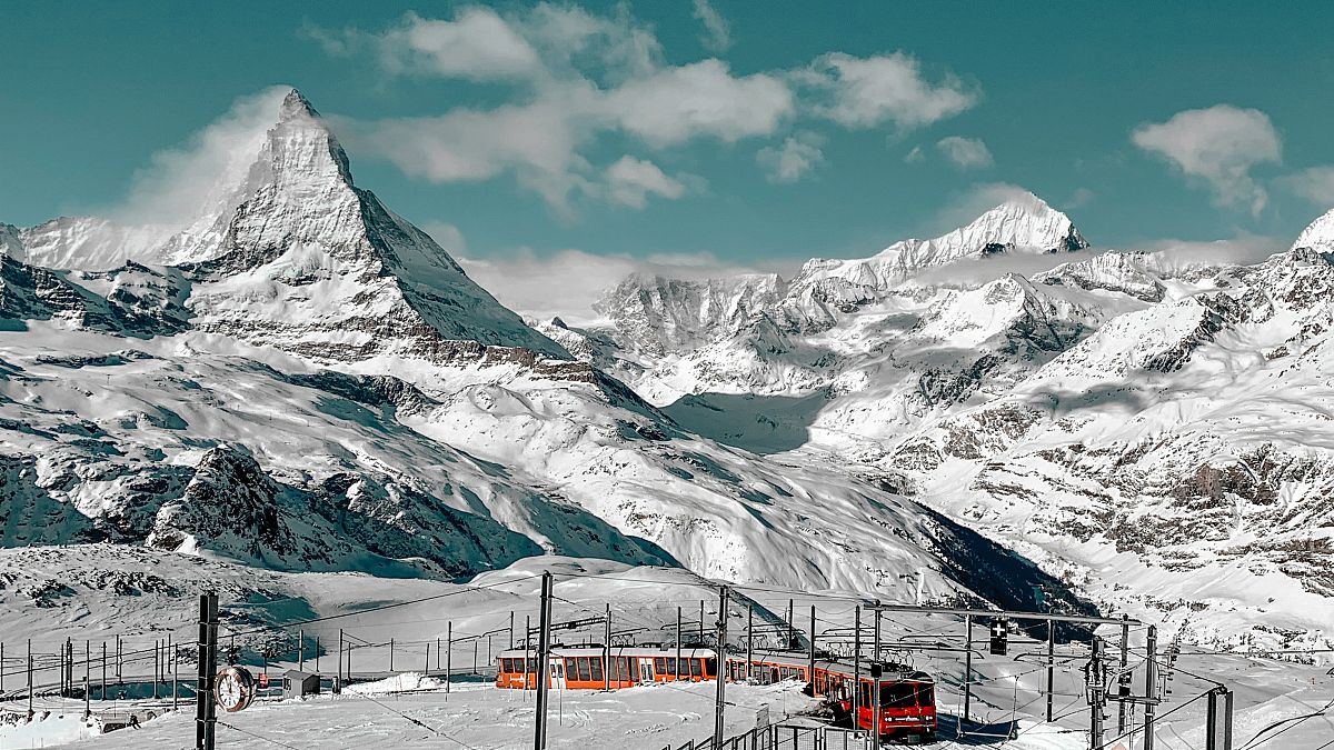 Visit a rotating mountain restaurant and Europe’s highest station on this epic winter railway tour