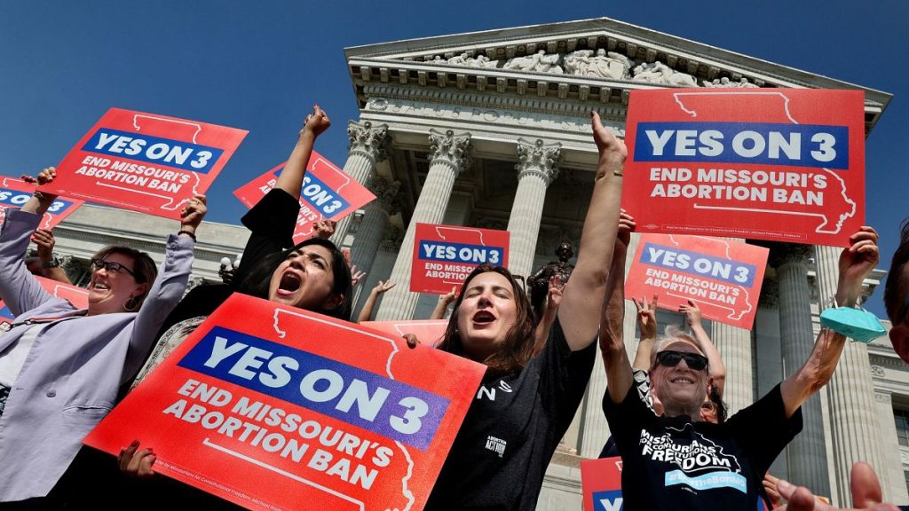 Supporters of Amendment 3, which would expand abortion access in Missouri, celebrate on 10 September in Jefferson City, Missouri.