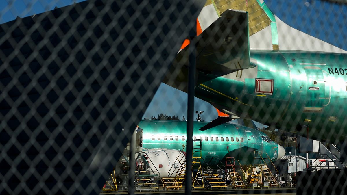 Boeing 737 Max aircrafts are seen behind fences at the company