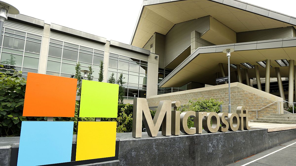 In this July 3, 2014, file photo, the Microsoft Corp. logo is displayed outside the Microsoft Visitor Center in Redmond, Wash