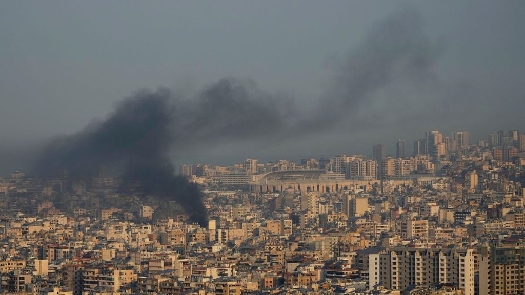 Smoke rises from an Israeli airstrike on Dahiyeh, in Beirut