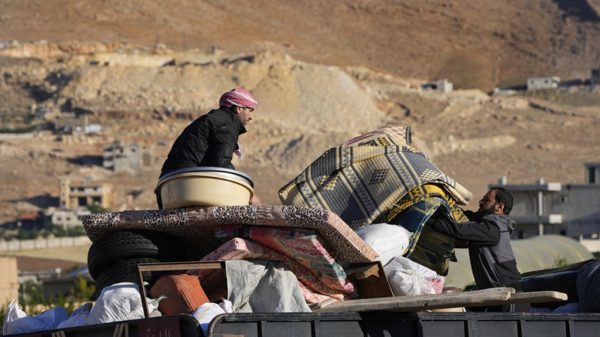 Lebanese civilians fleeing from Israeli air strikes.