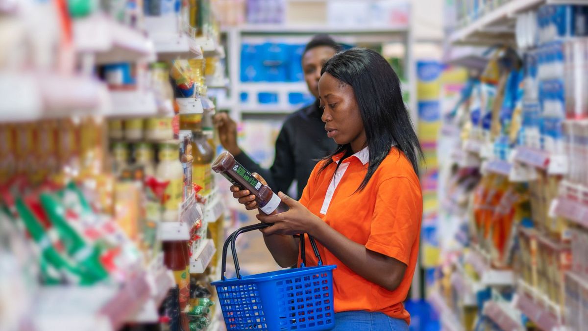 A woman shopping in a convenience store