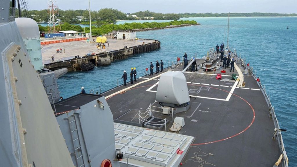 This photo provided by the U.S. Navy on Feb. 11, 2023 shows U.S. Navy Sailors aboard the USS Paul Hamilton (DDG 60) during a routine port visit at Diego Garcia.