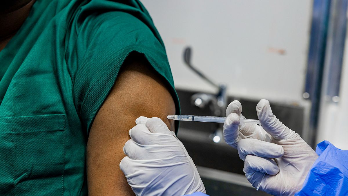 A health worker is vaccinated against Marburg virus in Rwanda.