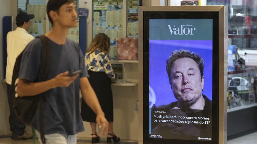 An ad by Valor media shows a photo of Elon Musk at a shopping center in Brasilia, Brazil, Monday, Sept. 2, 2024.