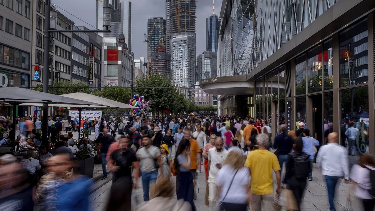 File picture of people walk in the main shopping street