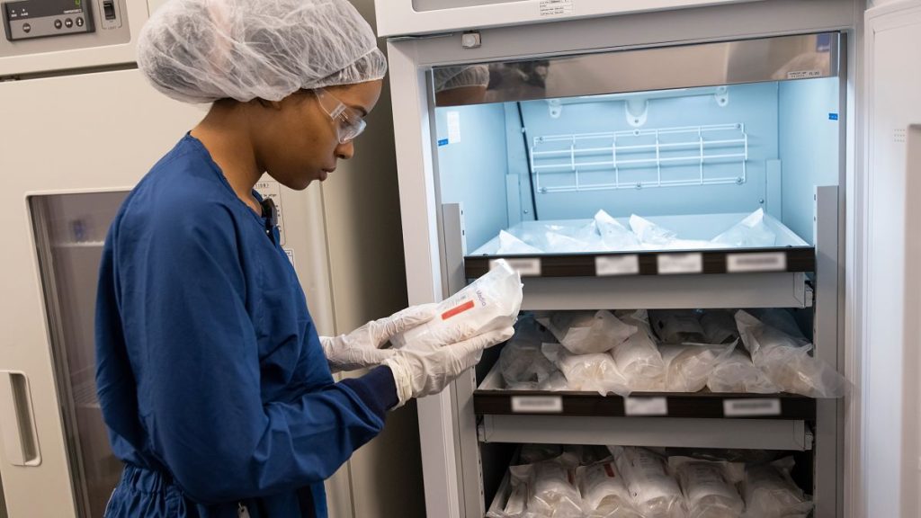 Examining materials inside the refrigeration room of our radioligand therapy (RLT) manufacturing facility in Indianapolis, Indiana, United States.