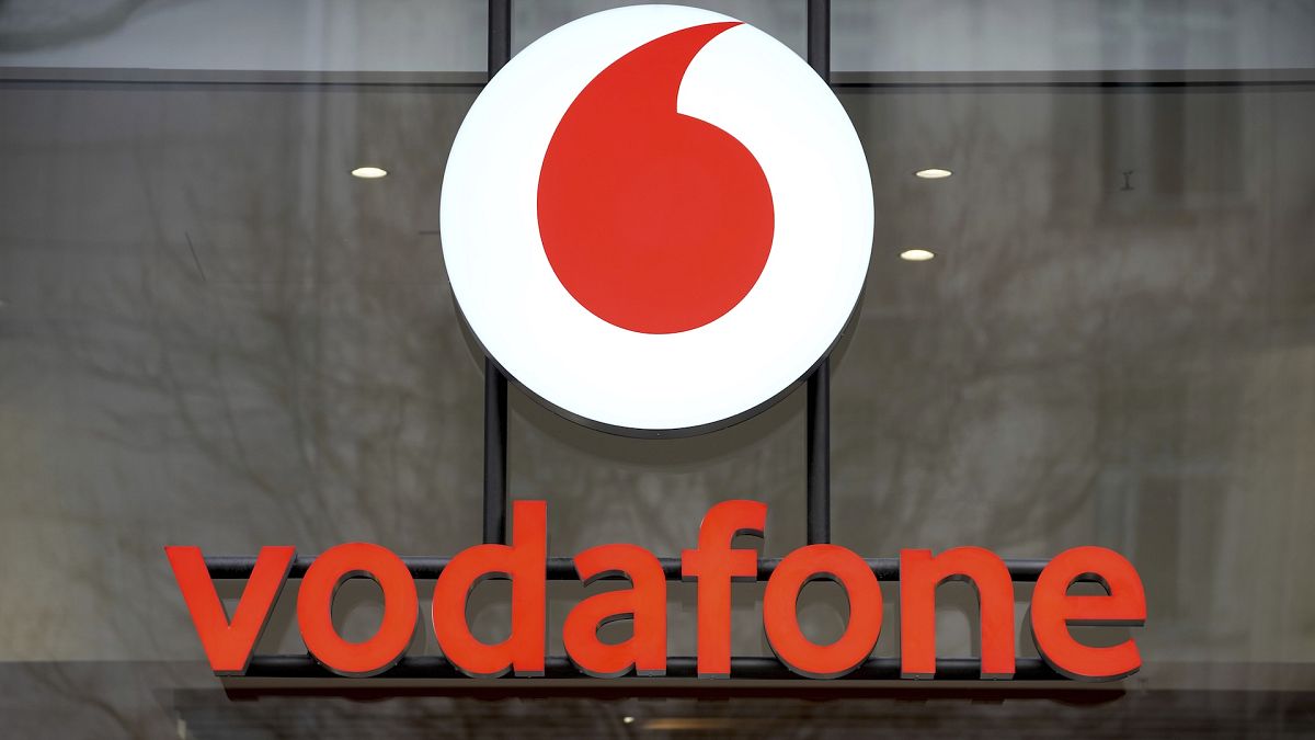 Vodafone logo is pictured on the entrance of a company