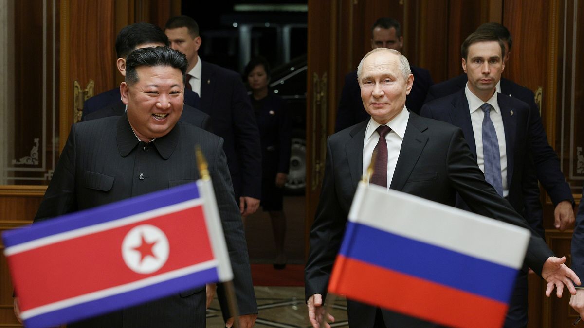 Russian President Vladimir Putin, right, and North Korea