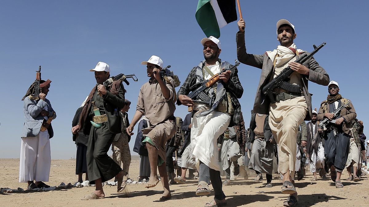 Houthi rebel fighters march during a rally of support for the Palestinians in the Gaza Strip and against the U.S. strikes on Yemen outside Sanaa on Jan. 22, 2024.