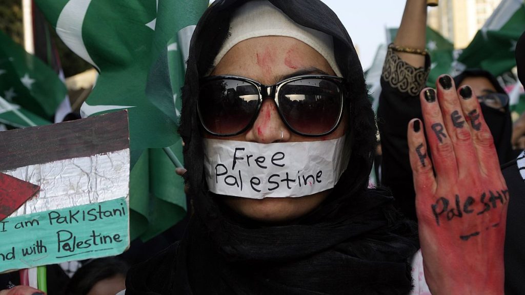 A demonstrator takes part in a rally against Israeli airstrikes and to show solidarity with Palestinian people living in Gaza and Lebanon, in Pakistan, Sunday, Oct. 6