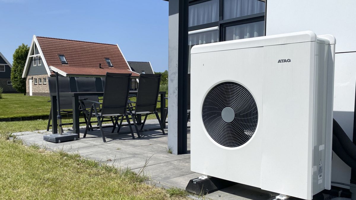 A domestic heat pump outside a house in Biddinghuizen, the Netherlands