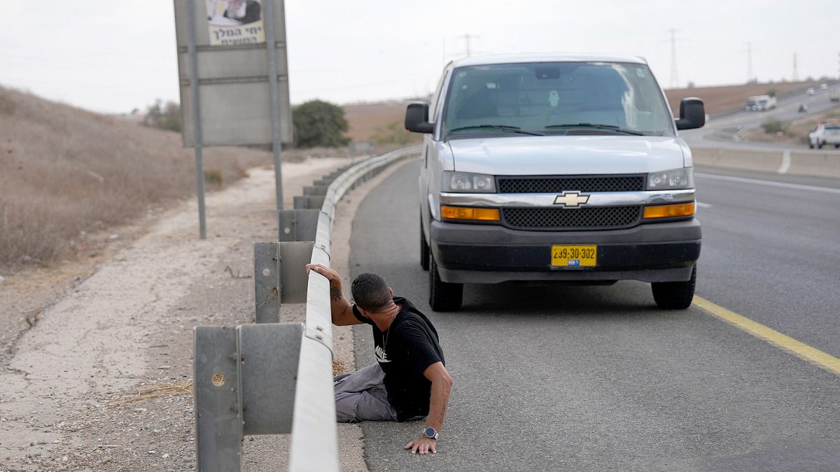 Residents seek shelter as sirens blaring announce imminent attack near the Gaza border, as Israel marks the one-year anniversary of the Hamas attack on Israel, 7 October 2024