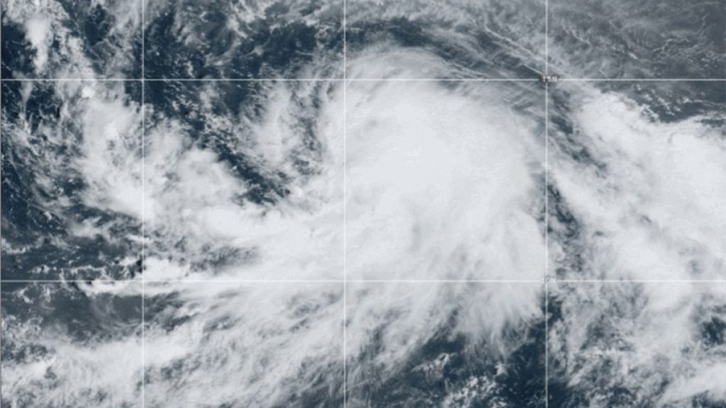 This satellite image provided by the National Oceanic and Atmospheric Administration, NOAA, shows Tropical Storm Kirk strengthening over the Atlantic Ocean.