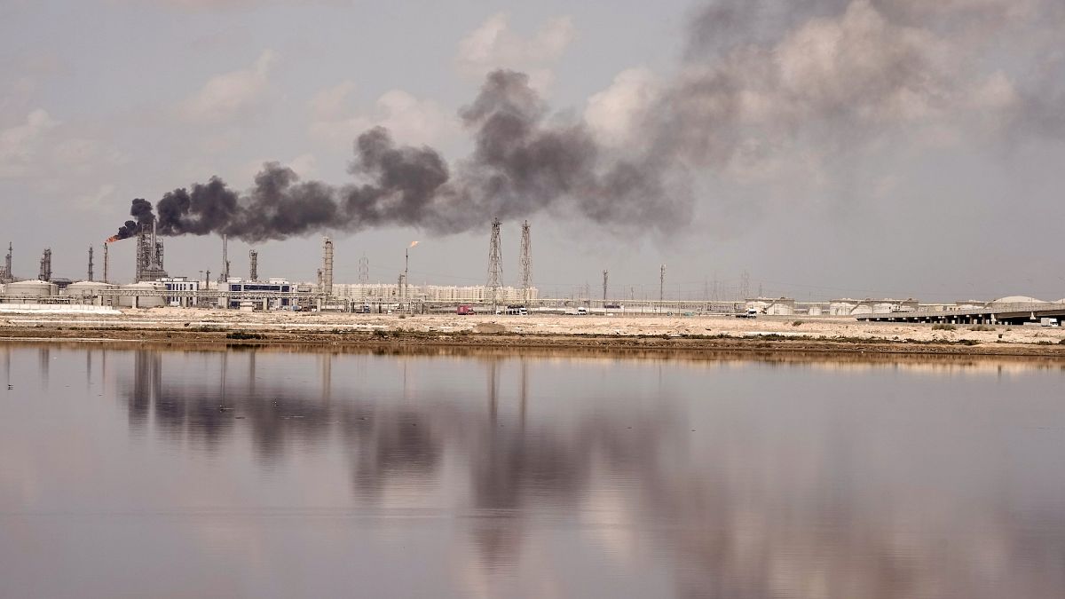 Smoke raises from an oil refinery in the Mediterranean harbour of the Delta port city of Alexandria, Egypt