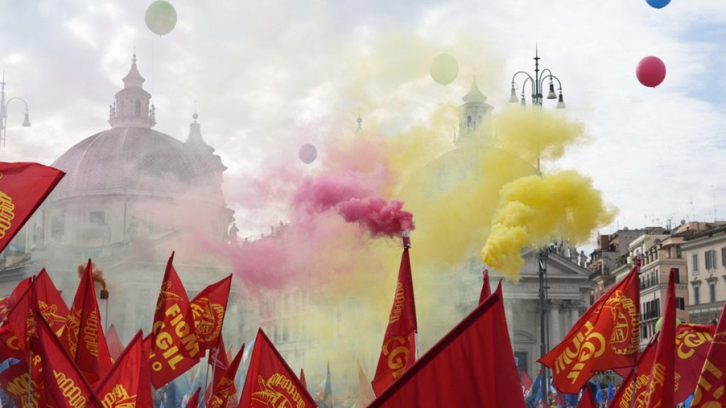 Workers of automotive sector march during a demonstration in Rome on the occasion of their national strike, Friday, Oct. 18, 2024