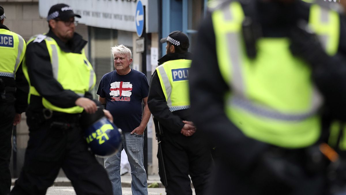 Police forces secure the area ahead of a far-right anti-immigration protest in Newcastle, England, Saturday, Aug. 10, 2024