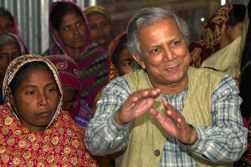 Professor Mohammed Yunus, founder of Grameen Bank, talks to a community in Kalampur village in Dhaka, Bangladesh. 21 January 2004.