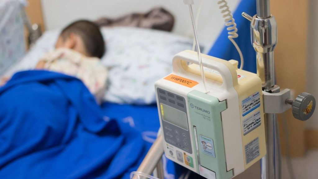 A child rests at the hospital.