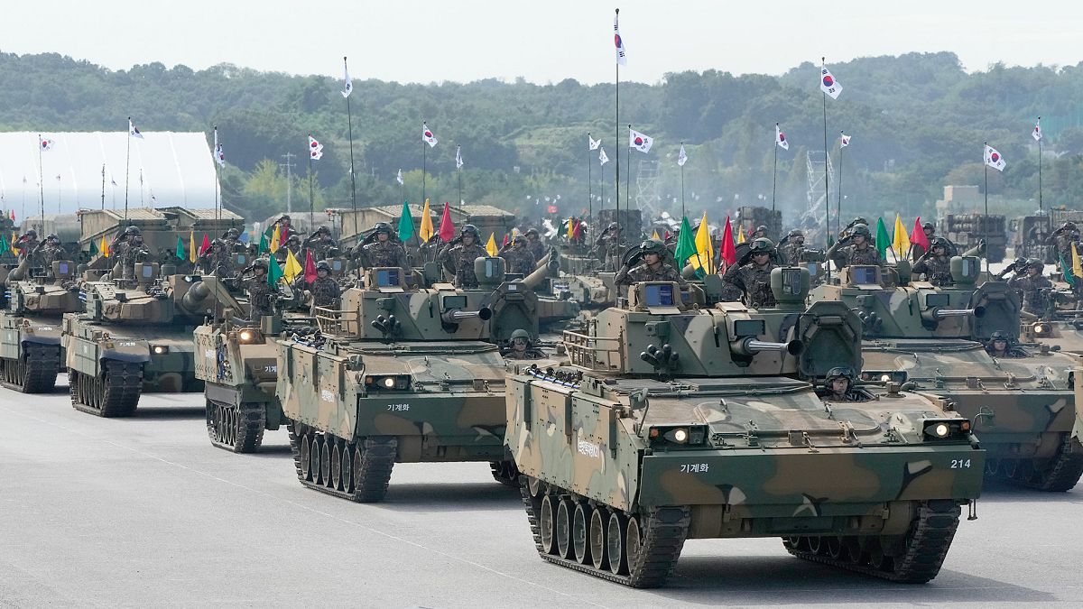 FILE: South Korean mechanised unit personnel parade with their armoured vehicles at Seoul air base in Seongnam, 25 September 2024