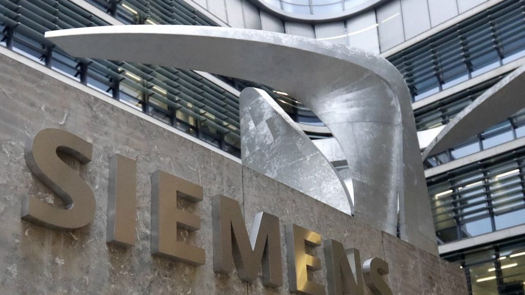 Photo shows the logo of German industrial conglomerate Siemens in front of their headquarters in Munich, Germany.