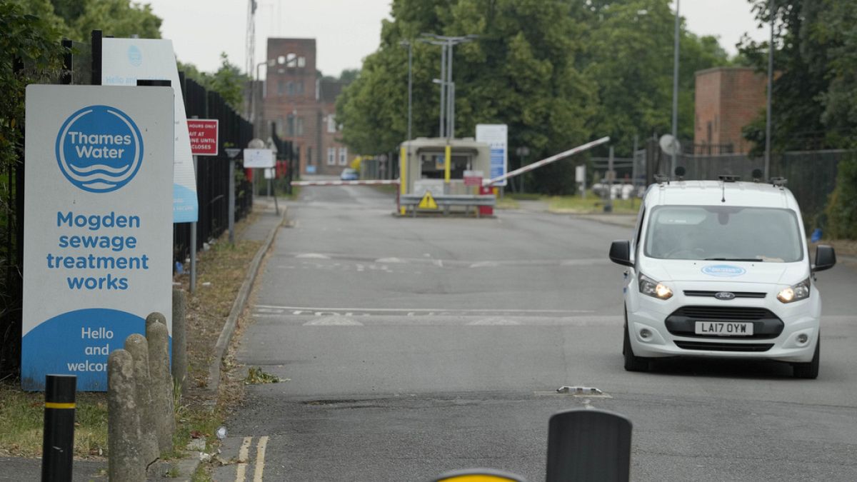 A car leaves the Thames Water plant in Twickenham, London, Wednesday, June 28, 2023.