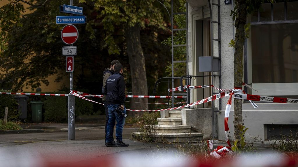 Police officers at the scene of an attack in Zurich