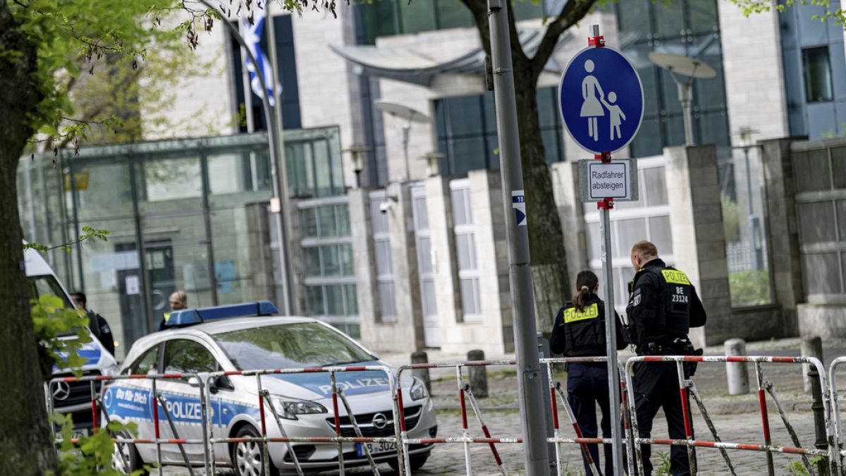 FILE - Police stand guard outside the Israeli embassy in Berlin, Sunday, April 14, 2024.