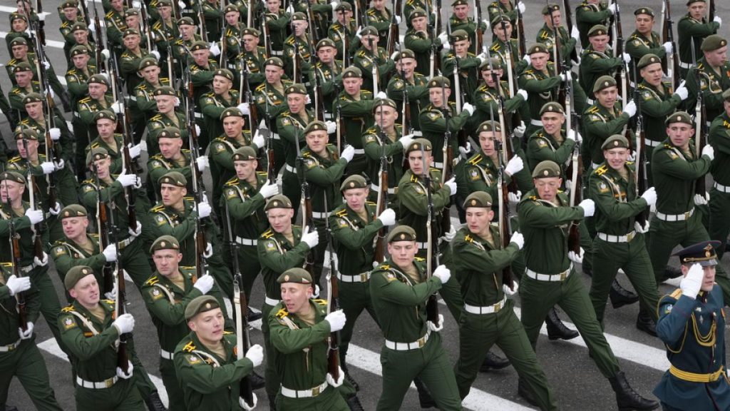 FILE - Russian army cadets march during a rehearsal for the Victory Day military parade at Dvortsovaya Square in Saint Petersburg, Russia, 5 May, 2024.