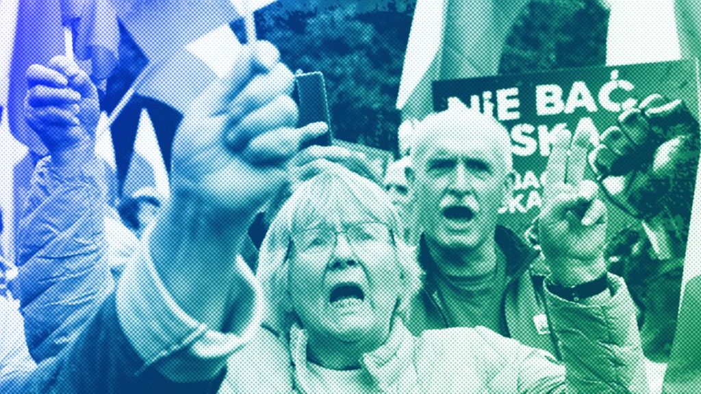 Backers of the right-wing opposition party Law and Justice take part in a protest ally against the policies of PM Donald Tusk