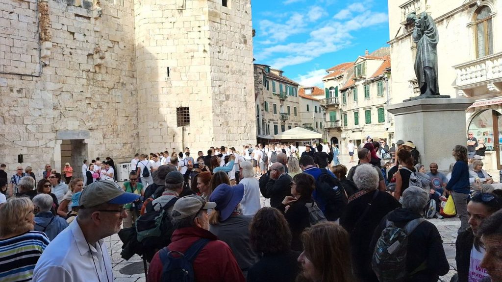 Tourists waiting for day trips and cruises in the People