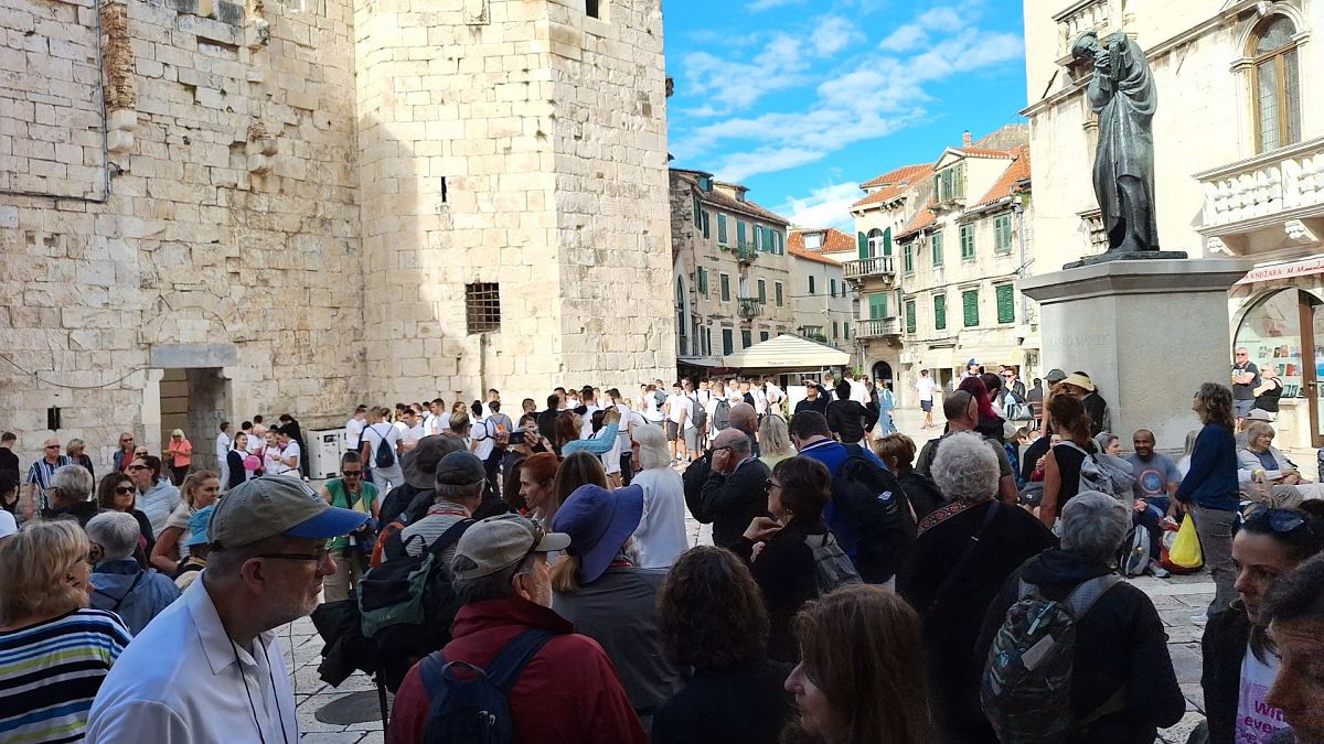 Tourists waiting for day trips and cruises in the People