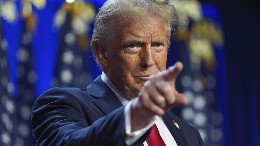 Republican presidential nominee former President Donald Trump arrives at an election night watch party at the Palm Beach Convention Center, Wednesday, Nov. 6, 2024, in West Pa