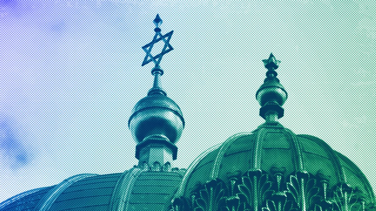 Clouds cover the sky over the Star of David on top of the New Synagogue in central Berlin, June 2023