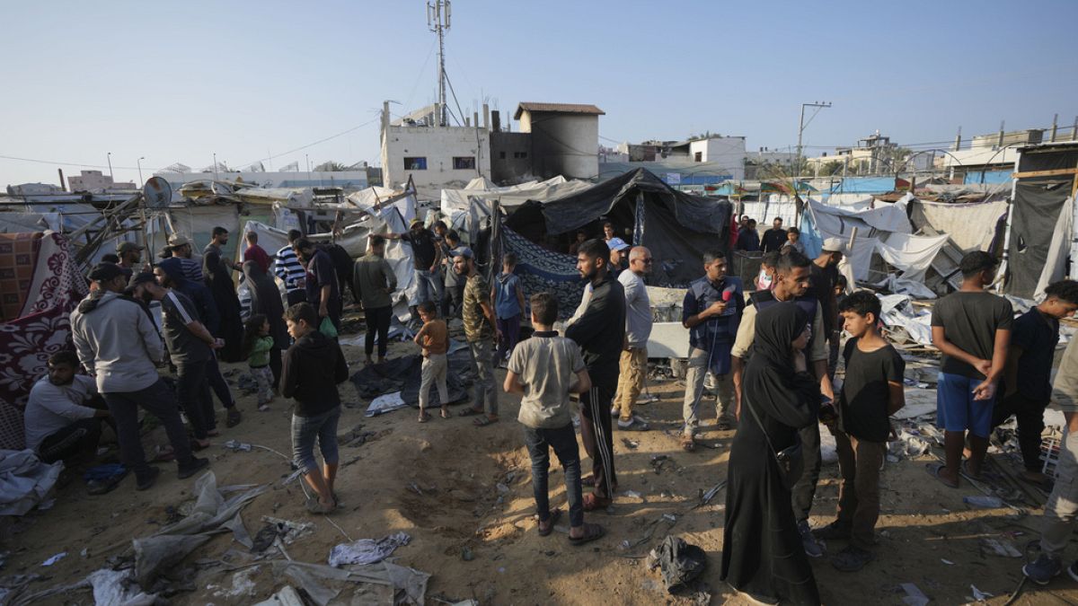 Palestinians gather at the site of an Israeli strike in the Al-Aqsa Hospital where displaced people live in tents, in Deir al-Balah, Gaza Strip, November 9th 2024